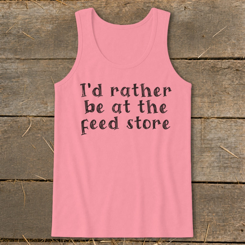 Pink tank top with "I'd rather be at the feed store" text.