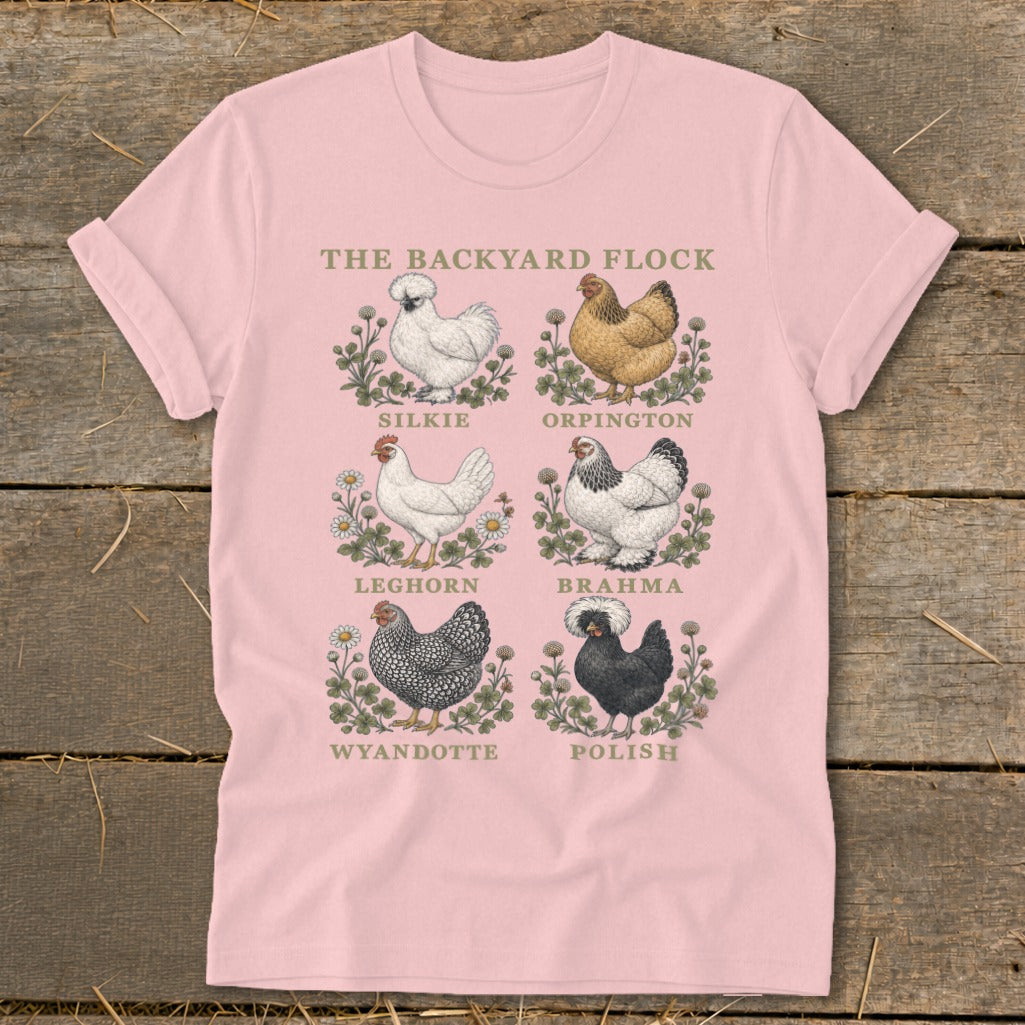 Pink t-shirt with six illustrated chicken breeds and text "The Backyard Flock".