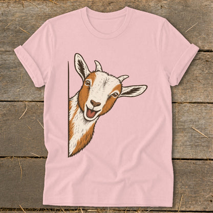 Pink t-shirt with a drawing of a happy goat peeking from the side.