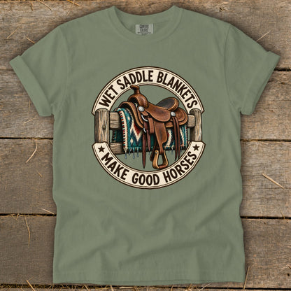 Saddle and blanket graphic with text "Wet Saddle Blankets Make Good Horses".