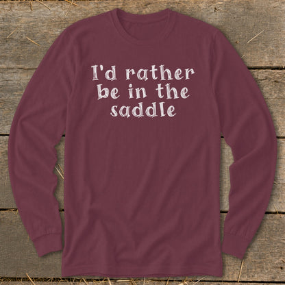 Maroon long-sleeve shirt with white text "I'd rather be in the saddle".