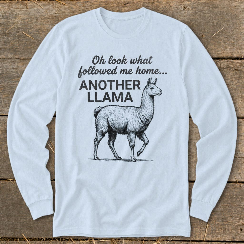 Light blue long-sleeve shirt with a drawing of a llama and text.