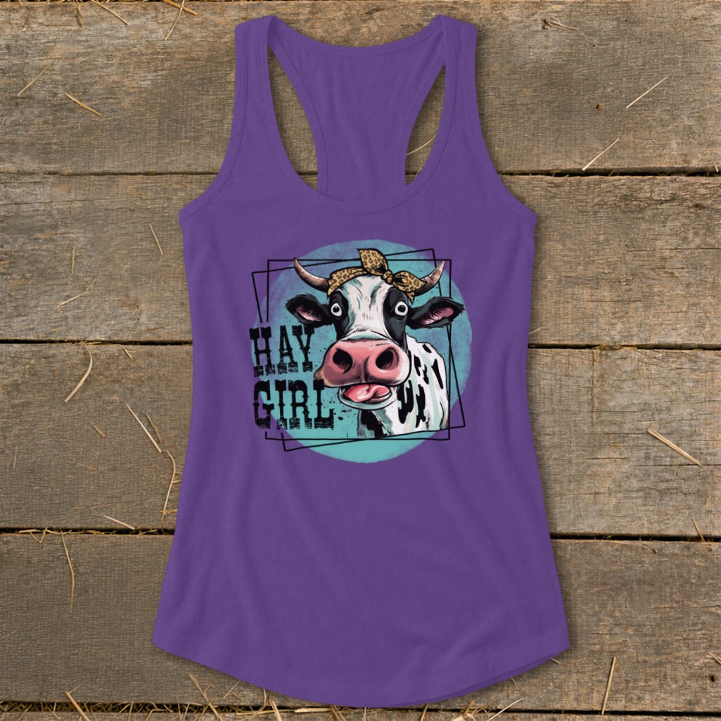 Purple tank top with a cow wearing a bandana and the text "HAY GIRL."