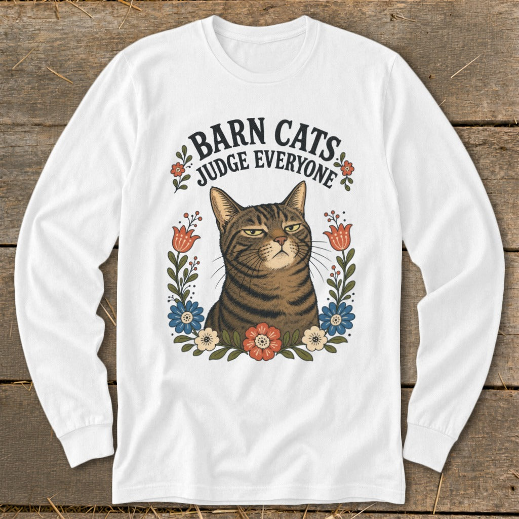 White long sleeve shirt with a tabby cat and "Barn Cats Judge Everyone" text.