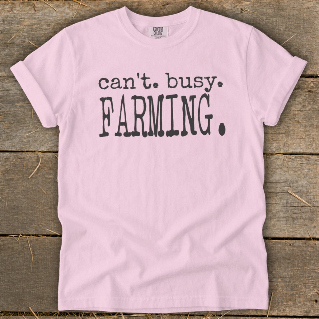 Pink t-shirt with black text that says "can't. busy. FARMING.".