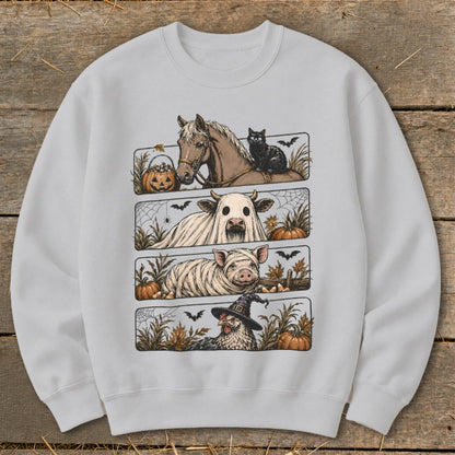 Sweatshirt with four Halloween farm animal designs: horse and cat, ghost cow, mummy pig, and chicken in witch hat.