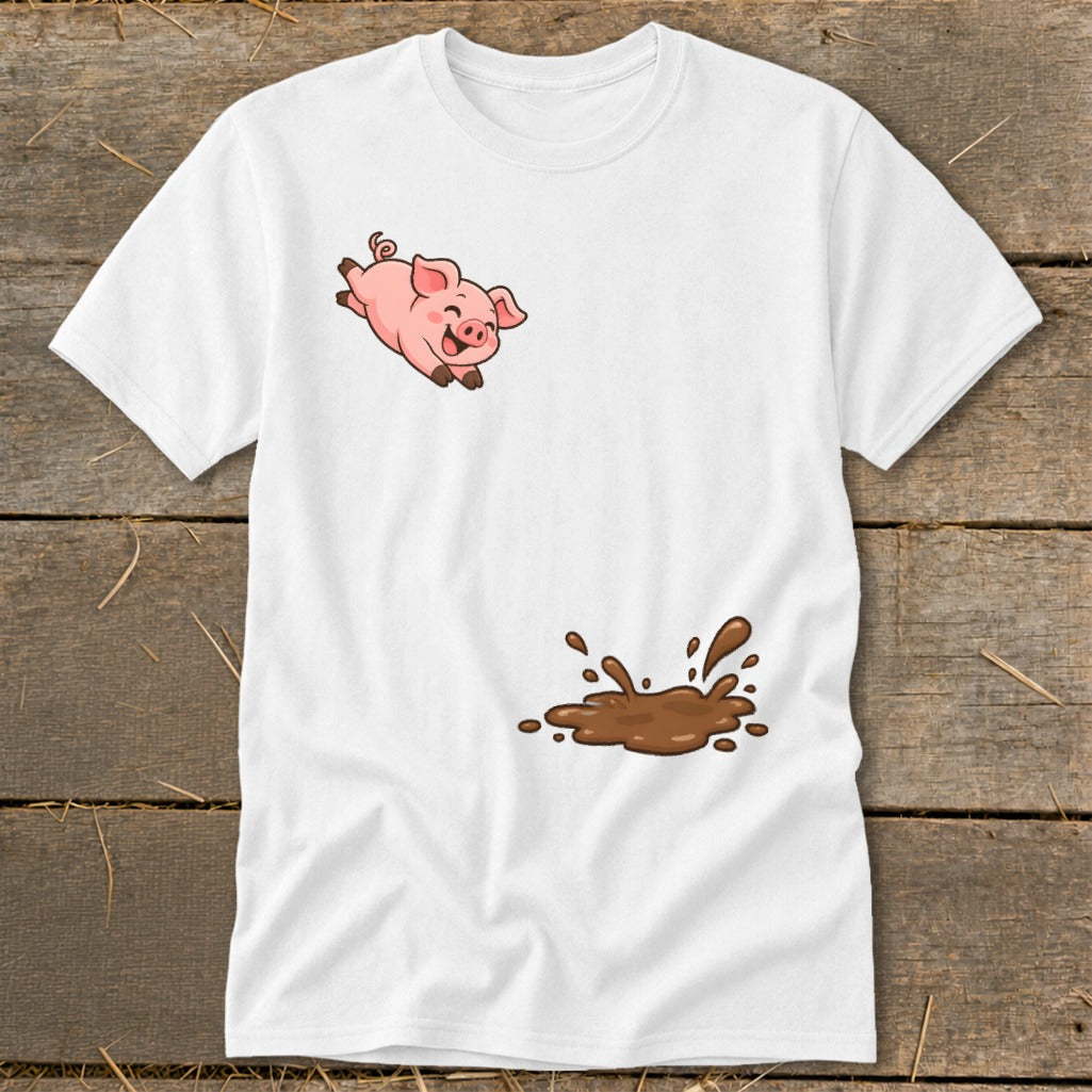 White t-shirt with a cartoon pig jumping over a splash of mud.