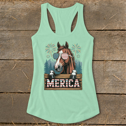 Horse wearing patriotic sunglasses with "MERICA" text and fireworks.