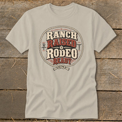 T-shirt with "Ranch Raised Rodeo Ready" text in a rope circle design.