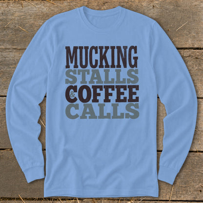Light blue long-sleeve shirt with text "MUCKING STALLS & COFFEE CALLS".