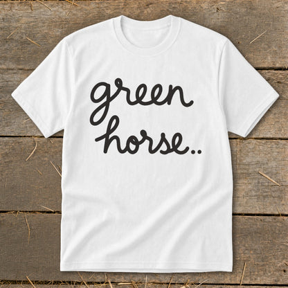 White t-shirt with black cursive text "green horse..".