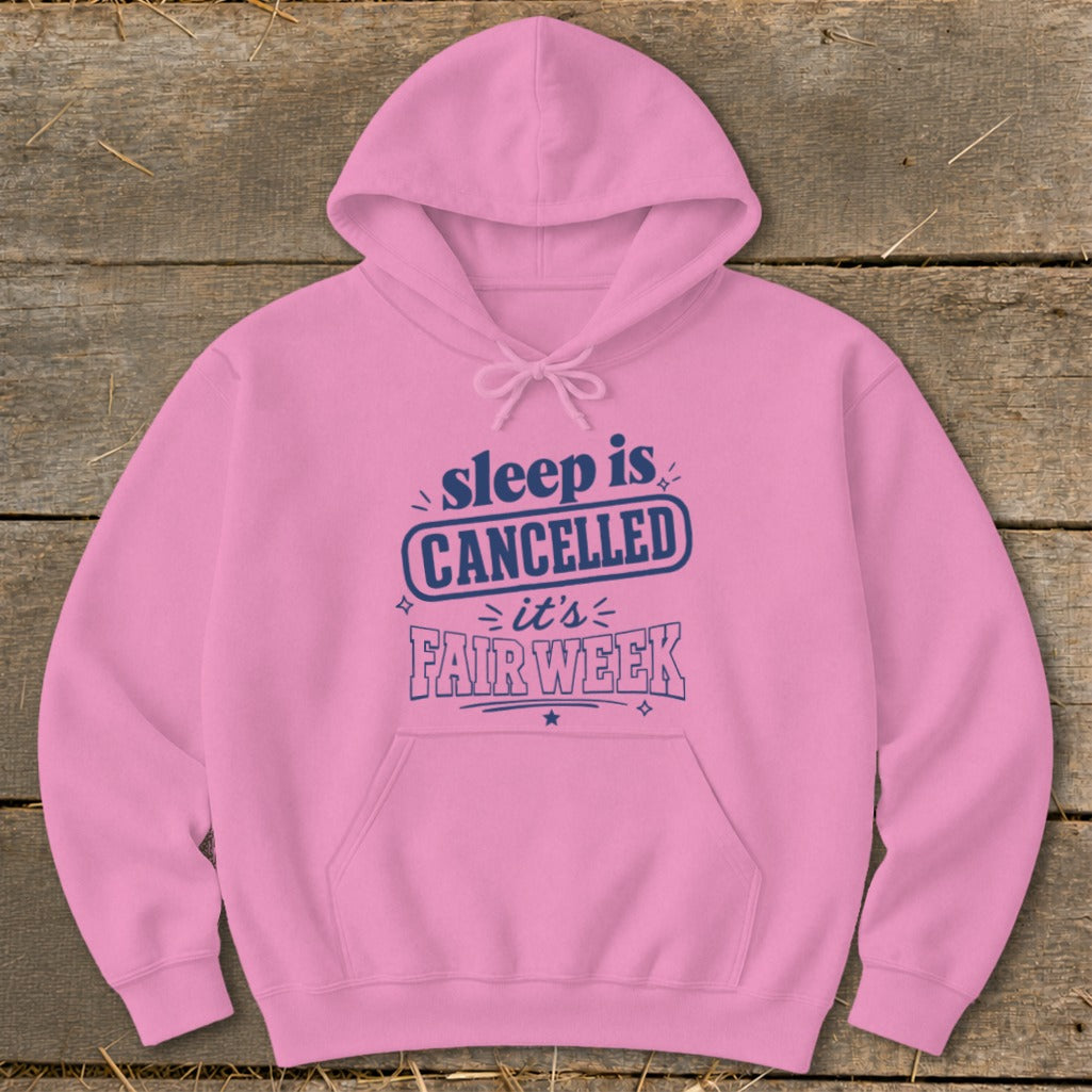 Pink hoodie with navy blue text reading "sleep is CANCELLED it's FAIR WEEK".