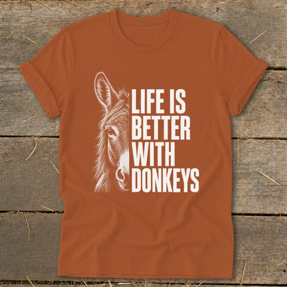 Orange t-shirt with white donkey graphic and text "Life Is Better With Donkeys".