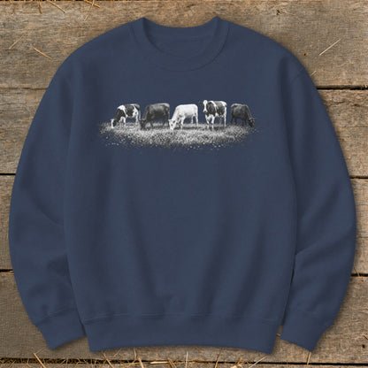 Navy sweatshirt with a black and white graphic of five cows grazing in a field.