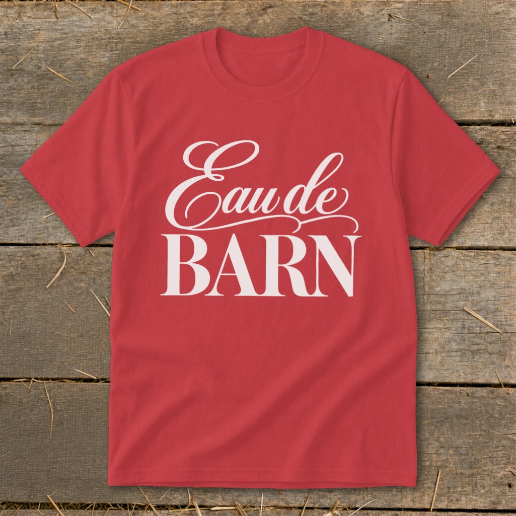 Red t-shirt with white script text "Eau de BARN" across chest.
