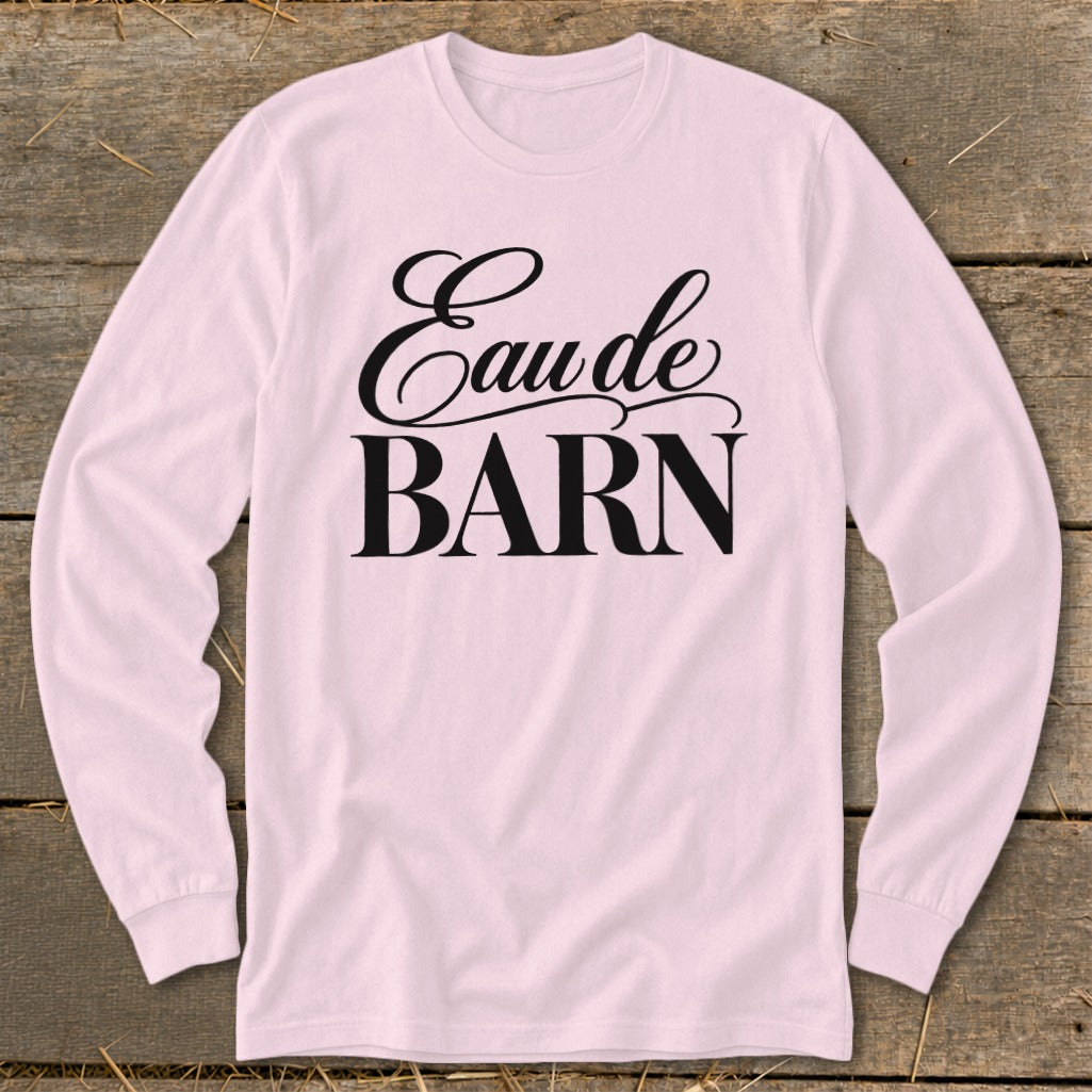 Pink long-sleeve shirt with black text "Eau de BARN".