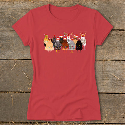 Christmas chickens wearing Santa hats and string lights on a red t-shirt.
