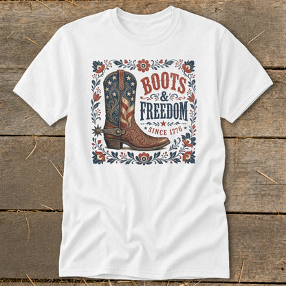 White t-shirt with "Boots & Freedom Since 1776" and American flag cowboy boot.