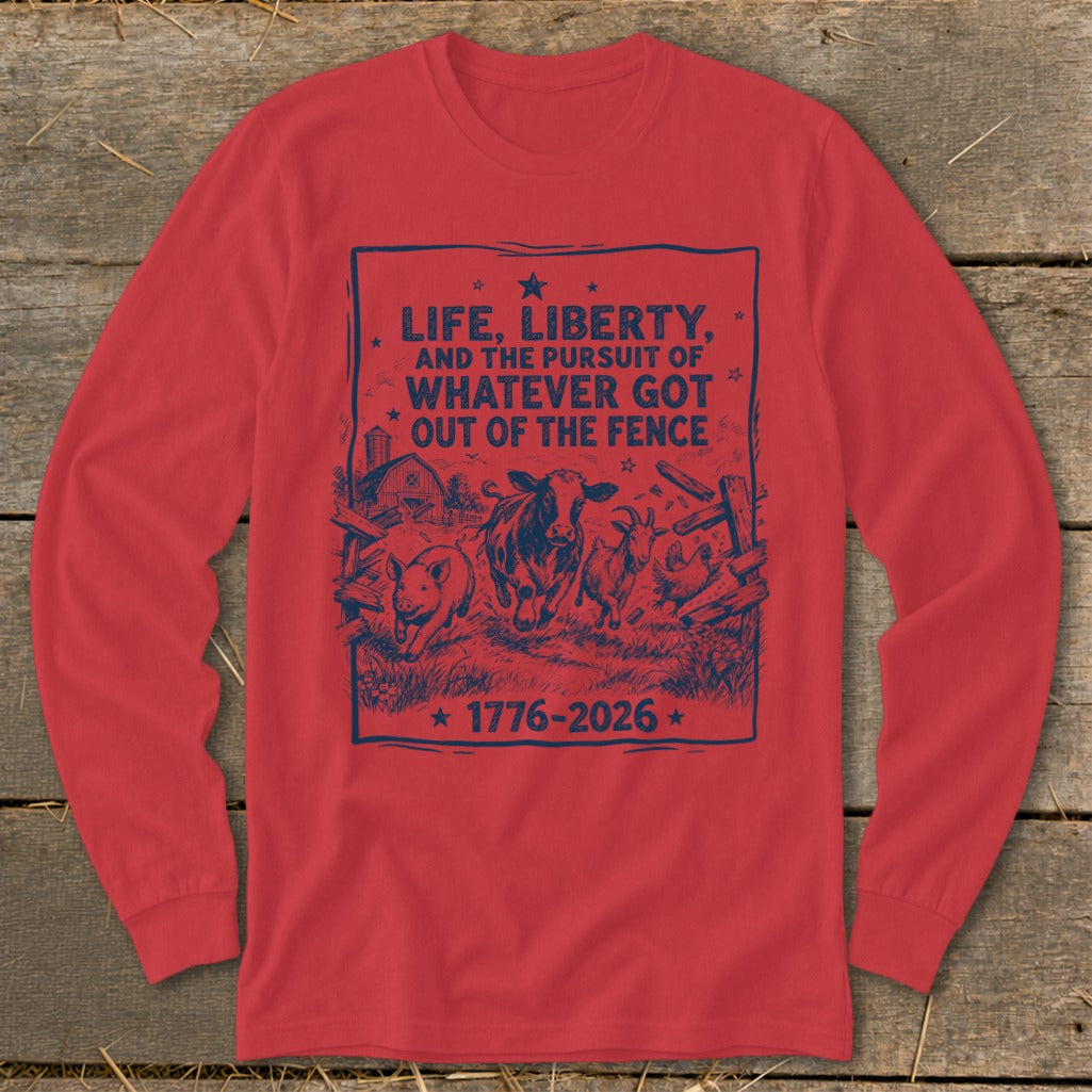 Red long sleeve shirt with a blue graphic featuring farm animals and the text "Life, Liberty, and the Pursuit of Whatever Got Out of the Fence".