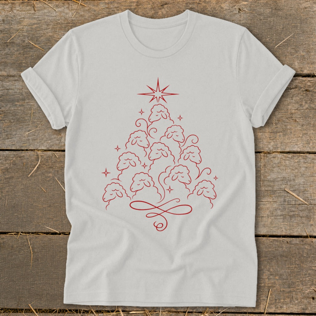 White t-shirt with a red line drawing of sheep forming a Christmas tree with a star.