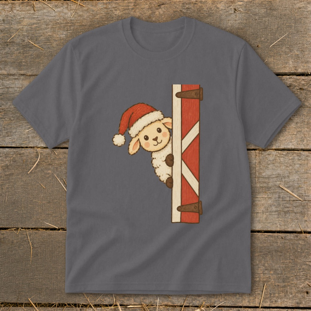 Sheep in Santa hat peeking from barn door on charcoal t-shirt.