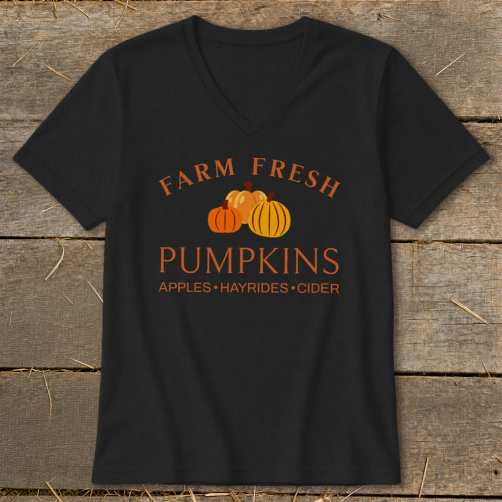 Black t-shirt with "Farm Fresh Pumpkins" and "Apples Hayrides Cider" text.