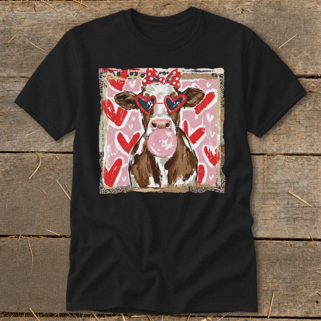 Cow with heart sunglasses chewing pink bubblegum on pink background with hearts.