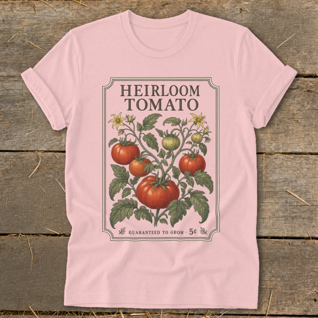 Pink t-shirt with "Heirloom Tomato" text and a tomato vine illustration.