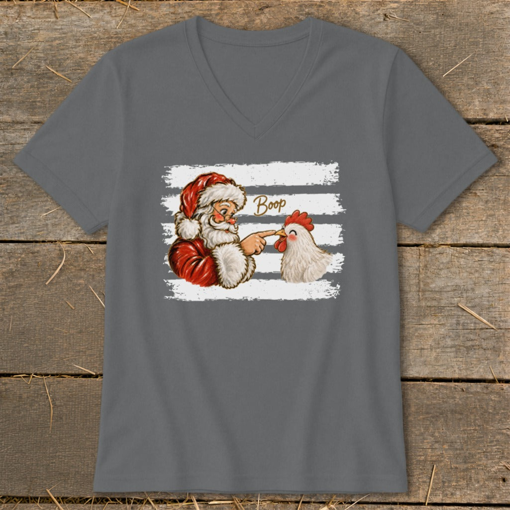 Santa boops a chicken with the word "Boop" above them.