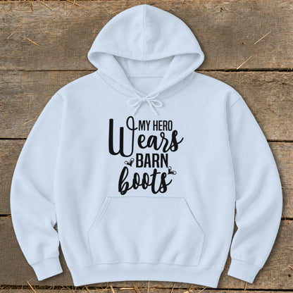 White hoodie with text "My Hero Wears Barn Boots".