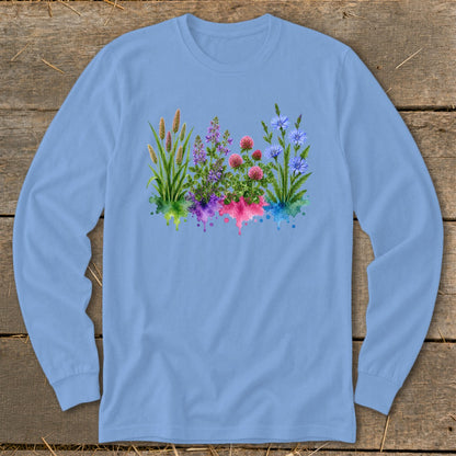 Light blue long-sleeve t-shirt with a colorful botanical watercolor print across the chest.