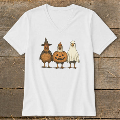 White t-shirt with three chickens in Halloween costumes: witch, pumpkin, and ghost.