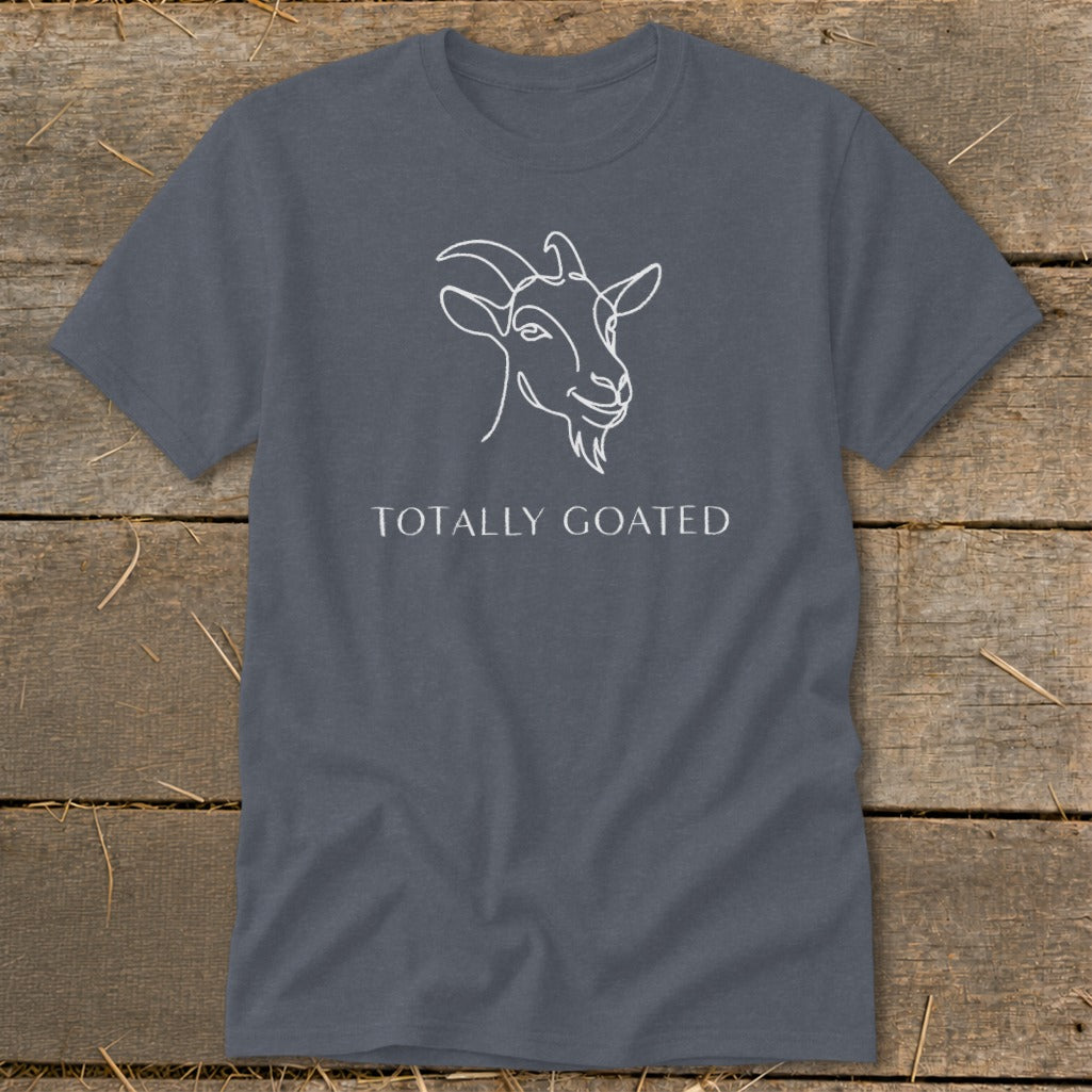 Gray t-shirt with white outline of a goat head and text "TOTALLY GOATED".