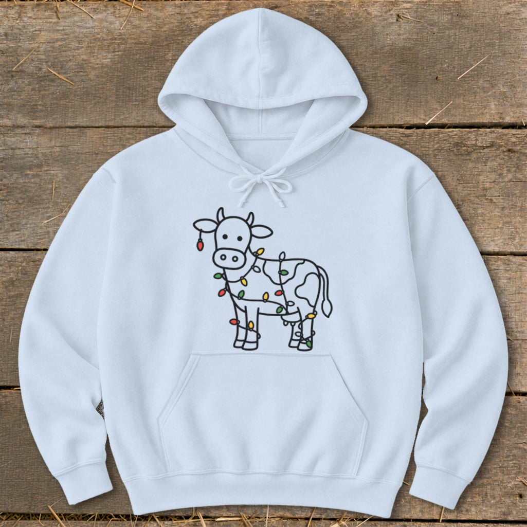 White hoodie with a line-art cow wrapped in colorful Christmas lights.