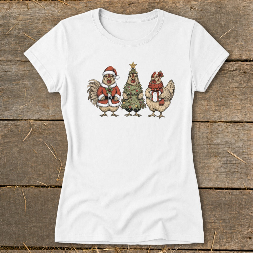 White t-shirt with a Christmas-themed illustration of three chickens and a tree.