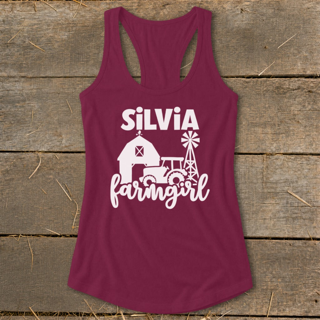 Maroon tank top with "Silvia Farmgirl" and farm graphics in white.