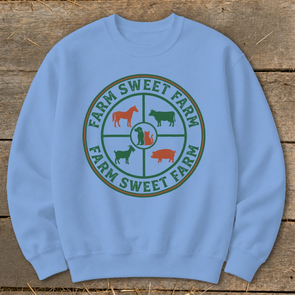Light blue sweatshirt with a circular farm animal graphic and text.