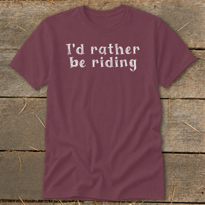 Maroon t-shirt with white text that reads "I'd rather be riding".