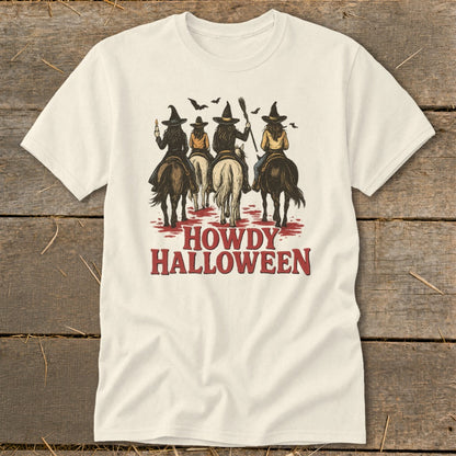 Four witches on horses with bats above, text "HOWDY HALLOWEEN".