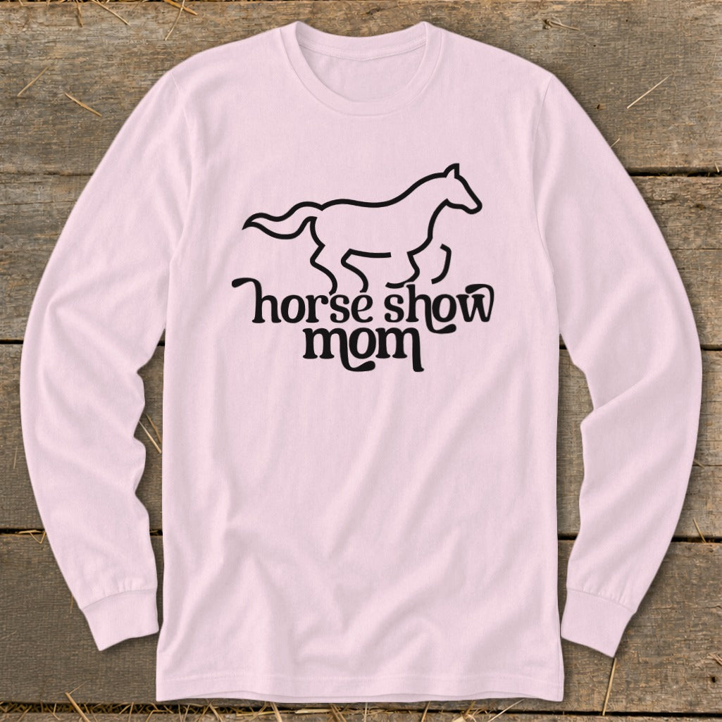 Light pink long-sleeve shirt with black graphic of a horse and text "horse show mom".