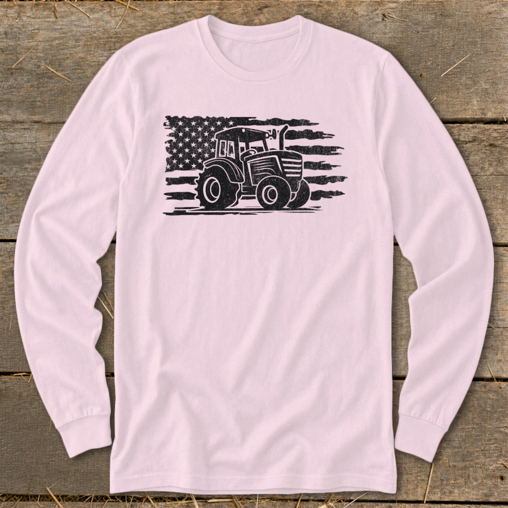 Long-sleeve pink shirt with distressed American flag and tractor graphic.