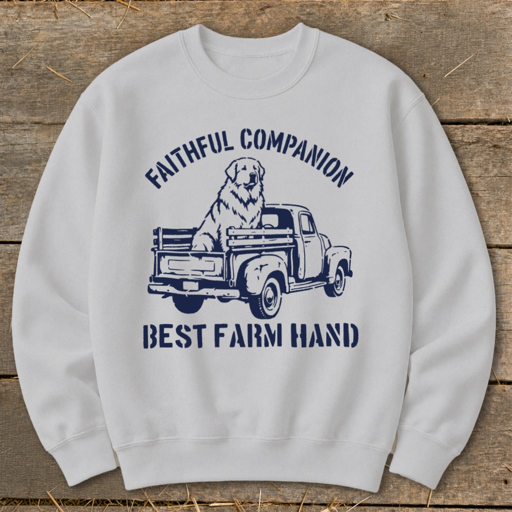 White sweatshirt with dark blue graphic of dog in truck and text.