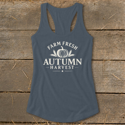 Blue tank top with "Farm Fresh Autumn Harvest" text and pumpkin graphic.