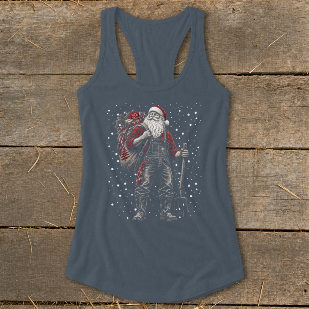 Santa Claus wearing overalls and a plaid shirt holds a pitchfork and carries a sack.