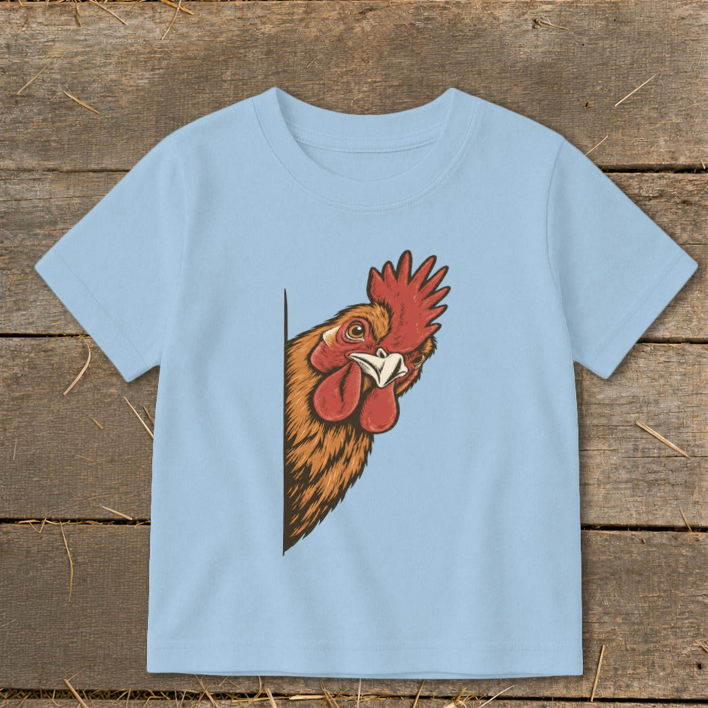 Light blue t-shirt with a rooster peeking from the left side.