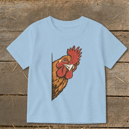 Light blue t-shirt with a rooster peeking from the left side.