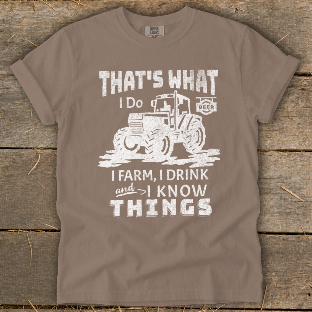 T-shirt with white graphic: THAT'S WHAT I DO, tractor, beer, I FARM, I DRINK and I KNOW THINGS.