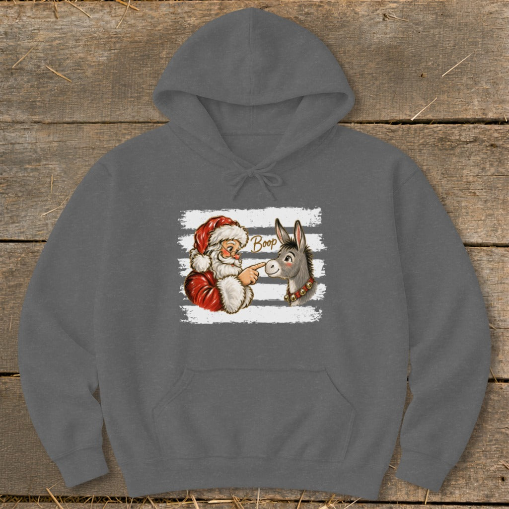 Santa booping a donkey with the word "Boop" written above.