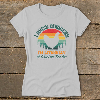 Light grey t-shirt with "I Raise Chickens" and a chicken silhouette over a sunset.