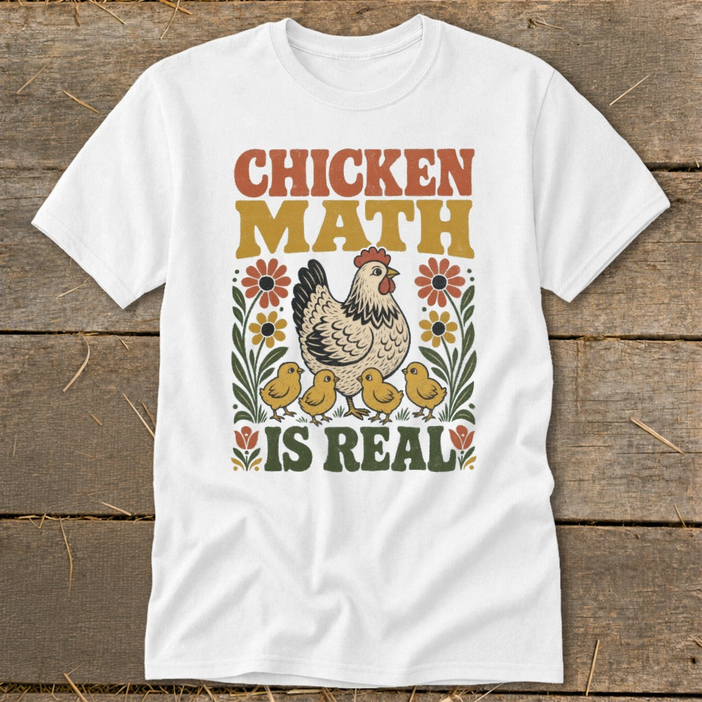White t-shirt with "Chicken Math Is Real" text, hen, and chicks graphic.